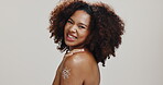 Face, black woman and sunscreen for dermatology, cosmetics and spf cream on white studio background. Portrait, African model and person with skincare, sun protection and treatment for natural lotion