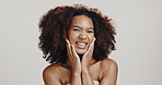 Face, black woman and skincare for smile, dermatology and healthy skin on white studio background. Portrait, African model and person with cosmetics, satisfaction and spa treatment for natural beauty