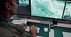 Man, army and typing with computer screen in control room, military battle and monitoring war. Soldier, feedback or global surveillance of satellite warning, government protection and secret services