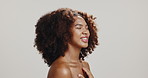 Skincare, beauty and glow with woman in studio for dermatology on white background mockup space. Hair style, makeup cosmetics and happy African model with salon treatment, aesthetic and eyes closed