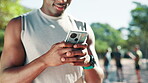 Phone, black man and runner in park for exercise, wellness and fitness. Message, communication and African athlete with endurance training, health and workout for cardio and jog outdoors in nature