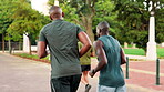 Back, men and running exercise at park for endurance training, health challenge or marathon performance. Fitness, people and runner club with cardio pace, routine workout or outdoor race for wellness