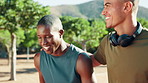 Talk, runners or happy people in park for fitness training, outdoor workout or sports exercise. Smile, funny men or healthy athletes with confidence, joke or support for running, jog practice or race