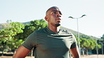Sweat, break and black man with fitness in nature for sports, exercise and training for marathon. African athlete, tired and exhausted from workout with breathe, run fatigue and cardio in park