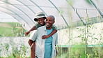 Farming, agriculture and father with child for piggyback, bonding and conversation for plants growth. Black family, farmer and boy in greenhouse for pointing, talking or sustainability for vegetables