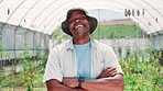 Crossed arms, man and face of farmer in greenhouse with pride for agriculture, sustainable or business. Nature, confident and portrait of African male person with produce production in countryside.