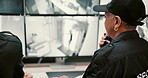 Security guard, screen and robbery with radio for surveillance, safety breach or alert in control room. People, CCTV operator or mall cop talking with display, speaker or signal for theft or danger