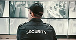 Back, security guard and man with inspection, video surveillance and pc with safety service. Person, employee and officer in workplace, uniform or control room with camera, information and footage