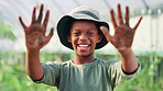 Face, dirt and hands with black child on farm for growth, agriculture and vegetable harvest. Plants, sustainability and environment with boy and soil in countryside for ecology, organic and nature