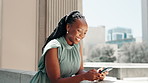 Phone, happy and businesswoman in city for typing email with company budget for approval. Communication, cellphone and African financial investor checking investment profit growth online on balcony.