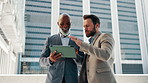Conversation, bridge and tablet with business men outdoor in city for collaboration or planning. Building, partnership and pointing with happy employee people talking in urban town for negotiation