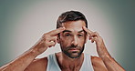 Check, man and face in studio for skincare, wellness or cosmetics with space for antiaging. Portrait, male person or model with inspection for wrinkles, beauty treatment or routine by gray background