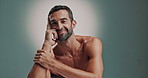 Pride, smile and man for face of skincare with facial glow, natural cosmetics and dermatology results. Portrait, male person or happy of grooming routine, self care and treatment on studio background