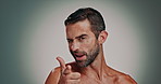 Skincare, happy and face of man in studio with natural, glow and facial treatment. Cosmetic, hygiene and portrait of male person with morning, dermatology or grooming routine by gray background.