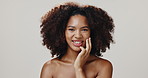 Skincare, face and beauty of African woman with glow, dermatology or shine on white studio background. Portrait, touch and makeup cosmetics with happy model, aesthetic and perfect skin for wellness