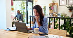 Business woman, laptop and thinking with coffee at cafe for business analytics, performance or update. Female person, freelancer or analyst with computer or paperwork for statistics at restaurant