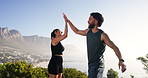 Fitness, mountain and couple high five for exercise, marathon training and workout together in nature. Sports, running and happy man and woman celebrate for wellness, challenge and health in morning