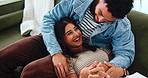Love, happy couple and tickle on sofa, laugh or bonding together with partner to relax. Funny, woman and playful man in home for romantic game, connection and holding hands for relationship above