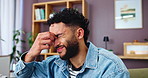 House, pain and man with headache, stress and overworked with burnout in living room. Person, apartment and guy on couch, migraine and tired with fatigue, exhausted and strain with pressure on temple