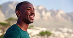 Running, fitness and black man on mountain with view for wellness, health and relax in nature. Sports, thinking and person rest, happy and smile for training, marathon exercise and workout in morning