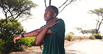 Fitness, man and stretching arms outdoor for running warm up, muscle strength and breathing exercise for performance. Athlete, black person and getting ready with nature workout and trail challenge