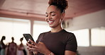 Cellphone, fitness and woman at pilates class typing for communication online with mobile app. Health, studio and female person with phone for social networking or contact on media with exercise.