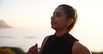 Woman, runner and outdoor at sunset, ocean and training for health, progress and speed for fitness. Girl, summer and sea with exercise, fast and workout for wellness in morning at beach in Costa Rica