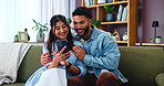 Hug, conversation and phone with couple on sofa in living room of home together for communication. App, relax or talking with man and woman embracing in apartment for online shopping or planning