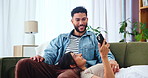 App, phone and talking with couple on sofa in living room of home together for communication. Browsing, conversation or relax with happy man and woman in apartment for online shopping or planning