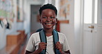 Education, future and face of black boy at school for learning, knowledge and smile. Child development program, study and growth with kid in hallway of Stem academy for student, classroom and youth