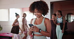 Gym, woman and walking with smartphone for fitness, virtual tutorial and communication on social media. Health club, female person and smile with mobile for application, exercise meme and online chat