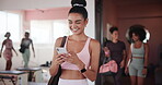 Gym, woman and happy with mobile for fitness, virtual tutorial and communication on social media. Health club, female person and laughing with smartphone for application, exercise meme and walking