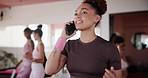 Phone call, fitness and woman in class, talking and happy for communication with contact or conversation. Exercise, smile and person with mobile in gym, wellness and girl with routine in morning