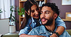 Hug, couple and talk in living room with smile, bonding and gossip on sofa in apartment. Embrace, man and woman with communication in lounge, relationship and relax in home with support together