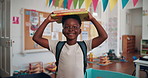 Happy, face and black child with books in classroom for literature learning, education or development. Scholarship, portrait and African boy student with stories for reading at elementary school.