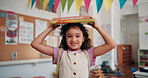 Face, learning an stack of books with child in school classroom for development, growth or learning. Future, knowledge and smile with happy girl student in academy for elementary study or scholarship