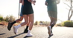 Fitness, mountain and legs of people on road for exercise, marathon training and workout together. Sports, running and men and women for wellness, challenge and health in morning for endurance