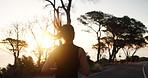Fitness, mountain and woman on road for exercise, marathon training and workout outdoors. Sports, sun and person for wellness, performance and health in morning for endurance, running or challenge
