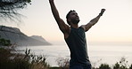 Man, winning and success with fitness on mountain for workout achievement or health goals in nature. Male person, athlete or runner with sky in relief for performance, exercise or training completion