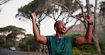 Happy, black man or winning with fitness on mountain for achievement, workout goal or success in nature. Male person, African runner or athlete with fist pump for cardio training or exercise in woods