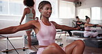 Personal trainer, women and workout group in class for instruction, exercise or performance. Challenge, fitness coach and reformer machine in gym with students for development or strength improvement
