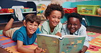 Reading, group and face of children with book in classroom for learning, development or growth. Kids, relax and boy students with storytelling on floor mat for literacy knowledge at elementary school