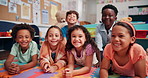 Face, classroom and group of children students of school for development, knowledge or growth. Diversity, scholarship and excited kids with smile on academy floor for literature lesson or education
