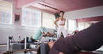 Pilates instructor, reformer equipment or woman in workout for fitness, body balance or group class. People, training machine or core strength exercise in studio for resistance, health or flexibility