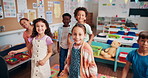 Dance, education and smile with group of students in classroom together for motor skills development. Happy, fun or music with boys and girls at school for academic growth, rhythm or scholarship
