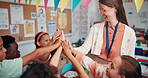 Teacher, students and high five in classroom, school and support with mind development at academy. Education, motivation huddle and gesture for learning success, celebration and woman with kids