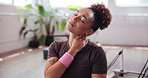Woman, neck pain and injury with discomfort at gym for muscle tension, sprain or pressure at health club. Active, female person or athlete with sore joint, ache or inflammation for fitness strain