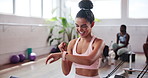 Happy woman, fitness and winning with smart watch at gym for workout goals, achievement or success. Excited, female person or athlete with smile or wristwatch for celebration, health or performance