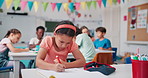 Girl, child and writing notes in classroom with books, study or test for knowledge at elementary school. Kid, learning and education with pen, solution or problem solving for scholarship at academy