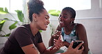 Women, friends and laughing with phone in yoga class of streaming, funny video and fitness guide. People, discussion and explaining with mobile on social media, pilates website and online instruction